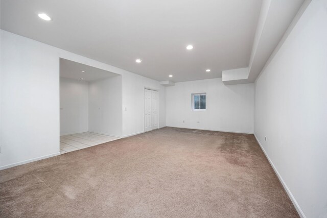 9231 N Natchez Ave, Morton Grove, IL 60053 - basement featuring light colored carpet, recessed lighting, and baseboards
