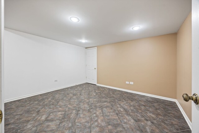 9231 N Natchez Ave, Morton Grove, IL 60053 - unfurnished room with baseboards and recessed lighting