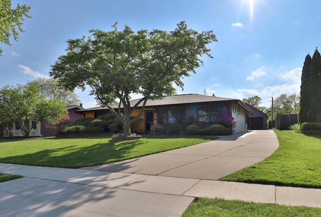 140 Princeton St, Hoffman Estates, IL 60169 - single story home with a front lawn, concrete driveway, and a garage