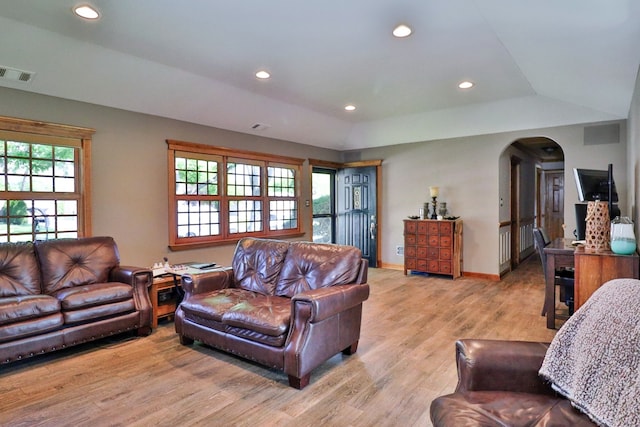 140 Princeton St, Hoffman Estates, IL 60169 - living room featuring arched walkways, light wood-style floors, recessed lighting, and baseboards
