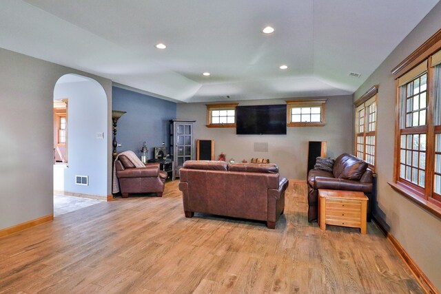 140 Princeton St, Hoffman Estates, IL 60169 - living room with light wood-style flooring, arched walkways, recessed lighting, and baseboards