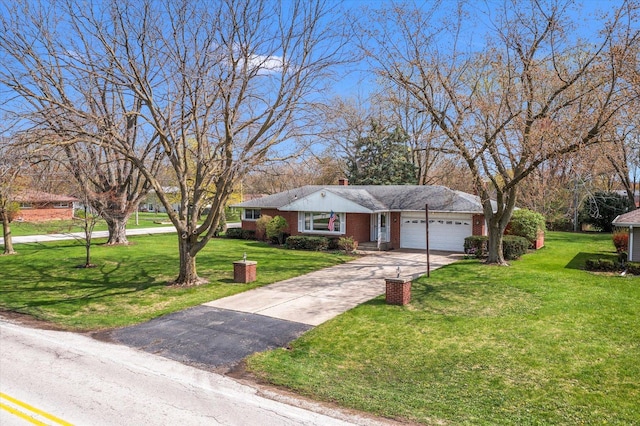 745 Konen Ave, Aurora, IL 60505 - view of front of home featuring a garage, concrete driveway, a front lawn, and brick siding