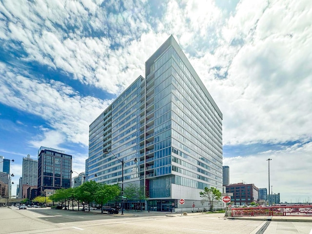 view of building exterior featuring a view of city