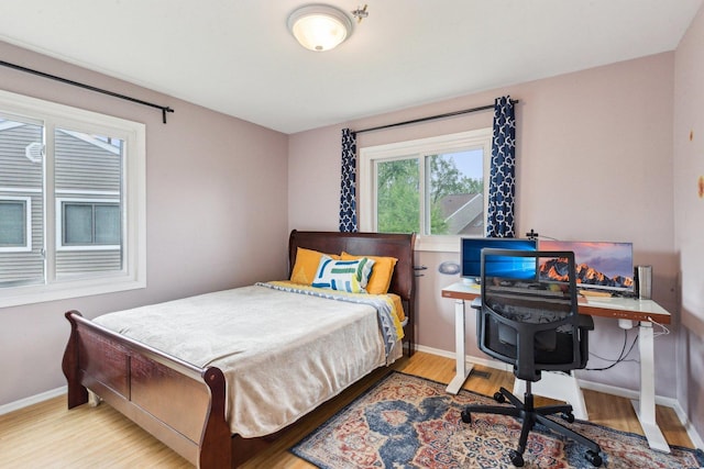 992 Hidden Lake Dr, Buffalo Grove, IL 60089 - bedroom featuring wood finished floors, baseboards, and an office area