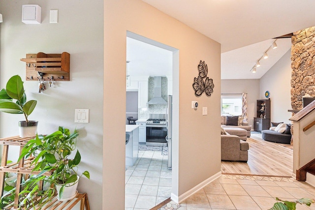 992 Hidden Lake Dr, Buffalo Grove, IL 60089 - hall featuring light tile patterned flooring and rail lighting