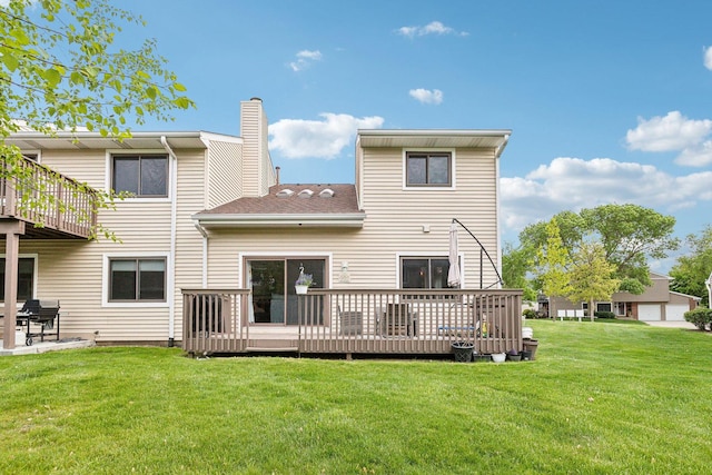 992 Hidden Lake Dr, Buffalo Grove, IL 60089 - back of property featuring a yard, a wooden deck, and a chimney