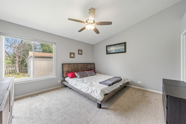 1247 Trinity Dr, Carol Stream, IL 60188 - bedroom with light carpet, vaulted ceiling, and a ceiling fan