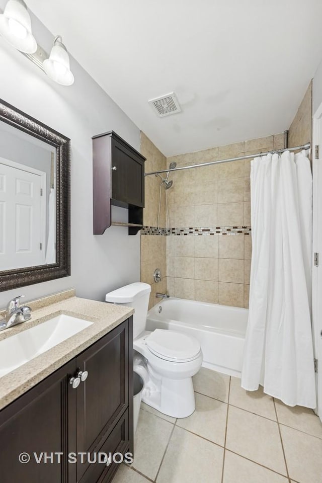 1247 Trinity Dr, Carol Stream, IL 60188 - full bathroom with vanity, tile patterned flooring, and shower / bath combo with shower curtain