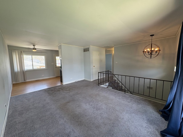 16822 91st Ave, Orland Hills, IL 60487 - carpeted spare room with baseboards, a ceiling fan, and a chandelier