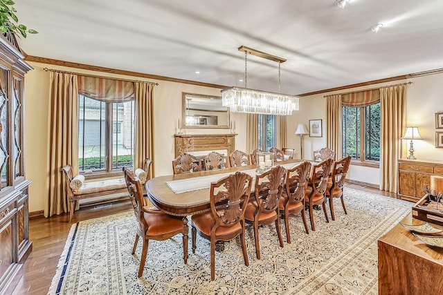 6425 N Tower Ct, Lincolnwood, IL 60712 - dining space featuring wood finished floors, crown molding, a chandelier, plenty of natural light, and baseboards