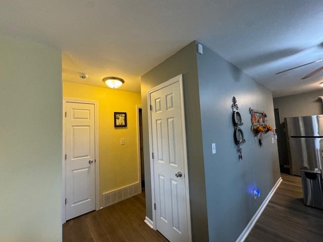 1521 E Stonehenge Dr Unit 1521, Sycamore, IL 60178 - hall with wood finished floors and baseboards