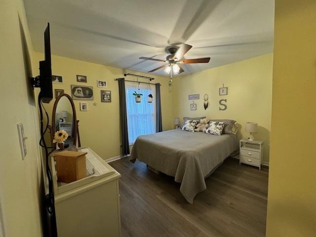 1521 E Stonehenge Dr Unit 1521, Sycamore, IL 60178 - bedroom with dark wood-style floors, a ceiling fan, and baseboards