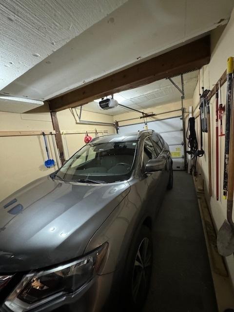 1521 E Stonehenge Dr Unit 1521, Sycamore, IL 60178 - garage with a garage door opener