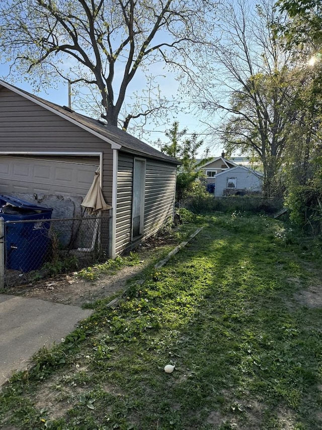 446 S Jackson St, Waukegan, IL 60085 - view of yard with an outbuilding and fence