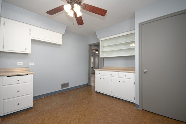 5533 S Menard Ave, Chicago, IL 60638 - kitchen featuring a ceiling fan, light countertops, white cabinets, and open shelves