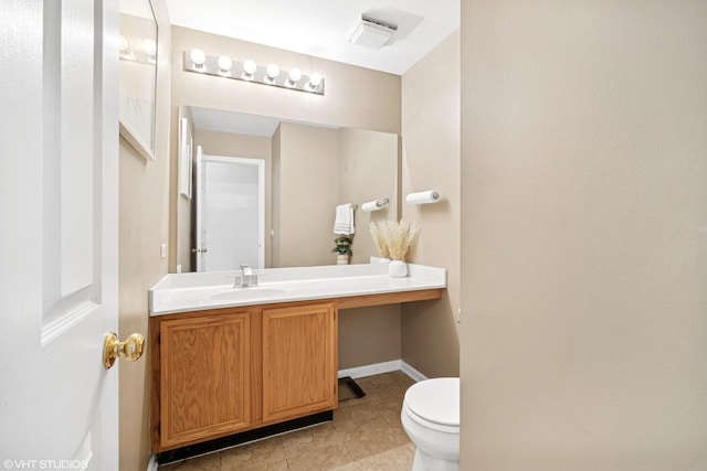36164 N Bridlewood Ave, Gurnee, IL 60031 - half bathroom with toilet, vanity, tile patterned flooring, and baseboards