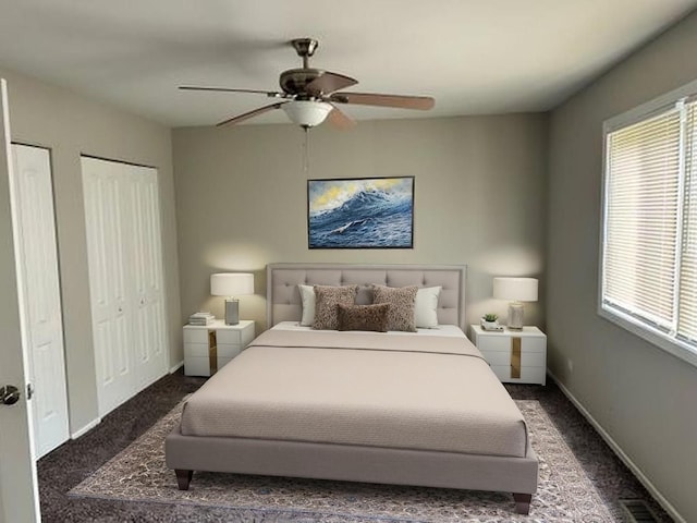 3702 Peach Grove Ln, Hazel Crest, IL 60429 - bedroom with carpet, multiple closets, baseboards, and ceiling fan