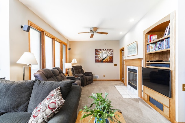 56 Huntsman Ln, Plano, IL 60545 - living room featuring a ceiling fan, light colored carpet, a fireplace, baseboards, and recessed lighting
