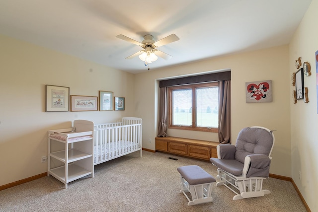 56 Huntsman Ln, Plano, IL 60545 - bedroom with light carpet, baseboards, and a ceiling fan