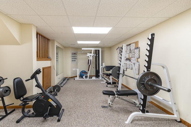 56 Huntsman Ln, Plano, IL 60545 - workout room featuring a drop ceiling and baseboards
