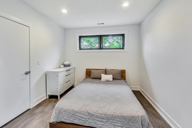 1300 N Artesian Ave Unit F, Chicago, IL 60622 - bedroom with dark wood finished floors, recessed lighting, and baseboards
