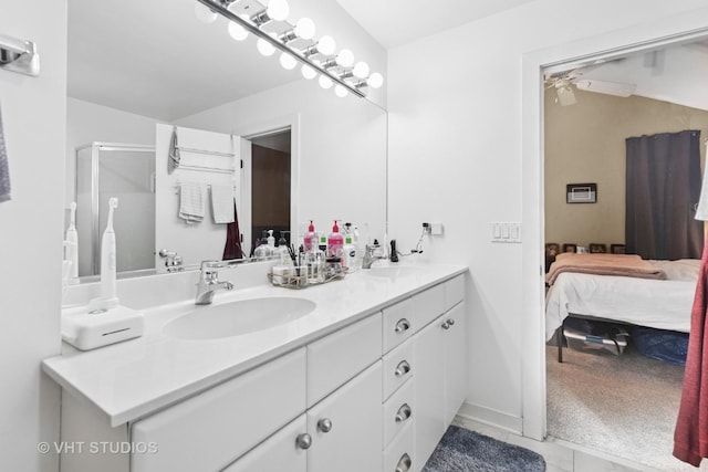 1845 N Marshfield Ave, Chicago, IL 60622 - bathroom with connected bathroom, double vanity, and tile patterned floors