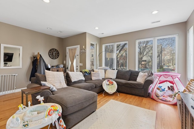 1845 N Marshfield Ave, Chicago, IL 60622 - living room featuring plenty of natural light, recessed lighting, and light wood-style floors