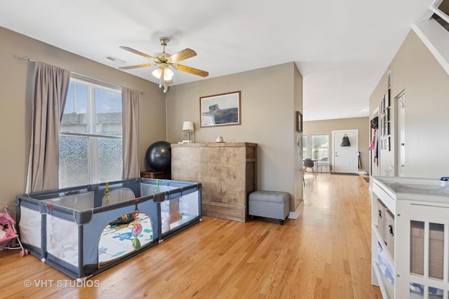 1845 N Marshfield Ave, Chicago, IL 60622 - bedroom featuring light wood-style flooring and ceiling fan