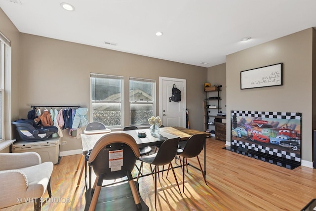 1845 N Marshfield Ave, Chicago, IL 60622 - dining room with light wood finished floors, recessed lighting, and baseboards