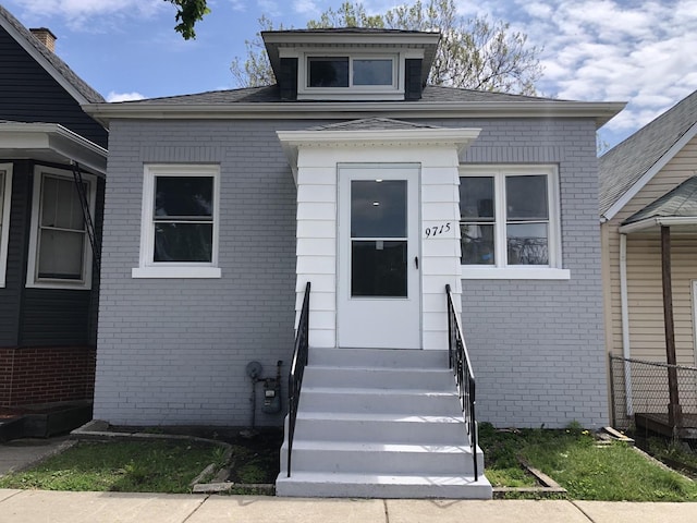 9715 S Ave N Ave, Chicago, IL 60617 - view of exterior entry featuring brick siding