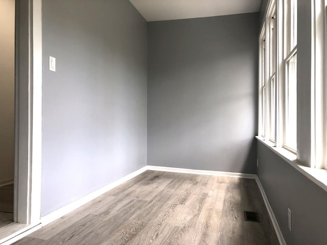 9715 S Ave N Ave, Chicago, IL 60617 - empty room featuring wood finished floors and baseboards