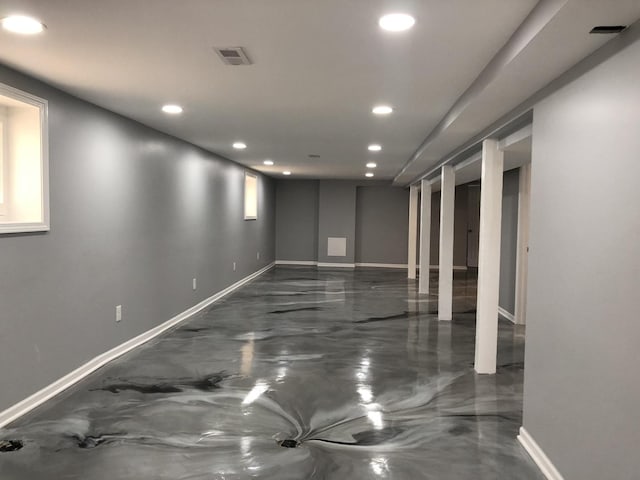 9715 S Ave N Ave, Chicago, IL 60617 - spare room featuring recessed lighting, finished concrete floors, and baseboards