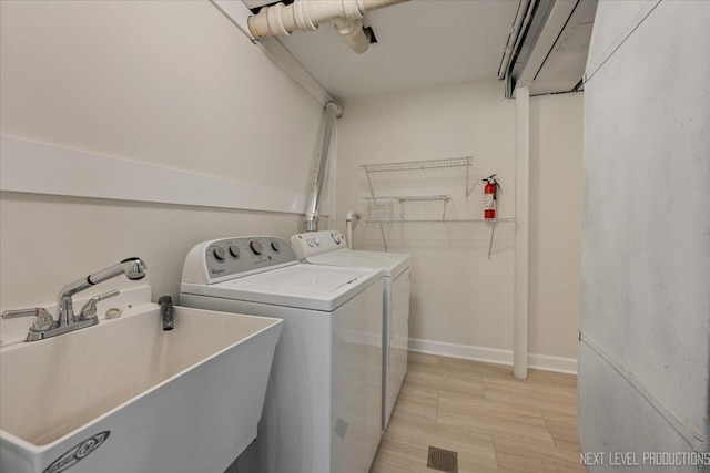 230 Elmwood Dr, Naperville, IL 60540 - washroom featuring washing machine and clothes dryer and baseboards