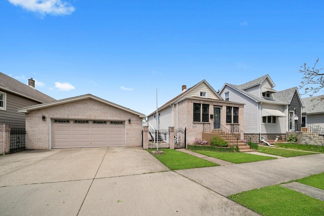 13524 S S Ave M, Chicago, IL 60633 - view of front of house with brick siding, a gate, and a garage