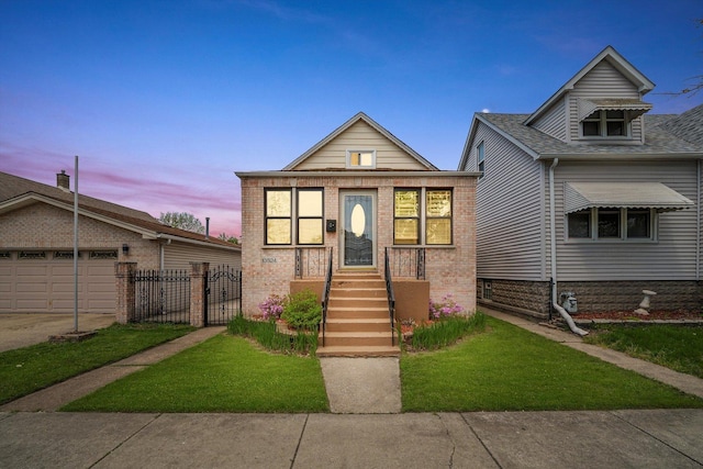 13524 S S Ave M, Chicago, IL 60633 - view of front of home featuring a garage, brick siding, and driveway