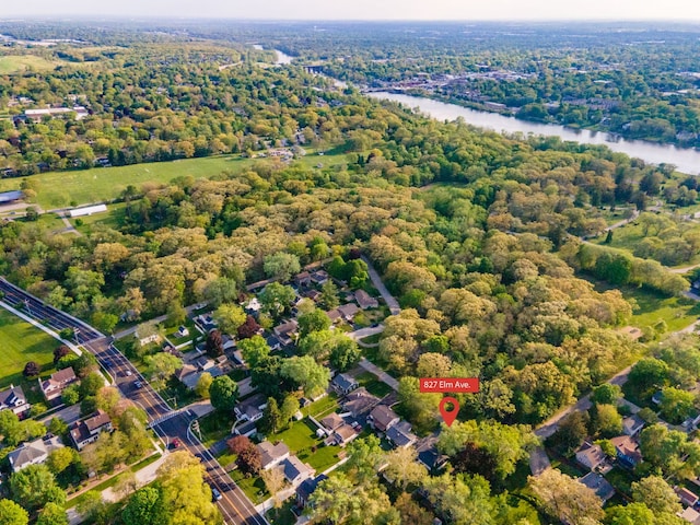 aerial view of property's location with a large body of water