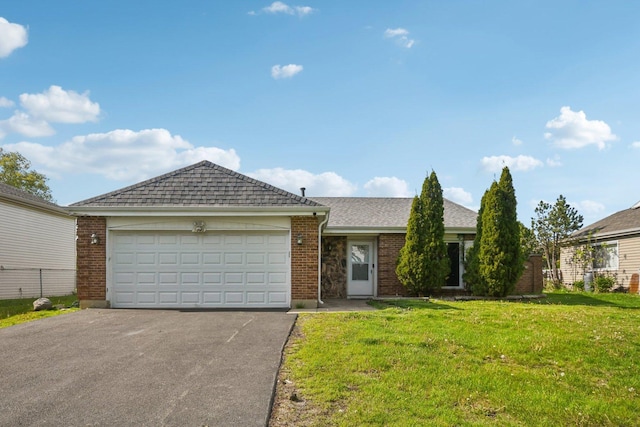 ranch-style house with asphalt driveway, a front lawn, an attached garage, and brick siding