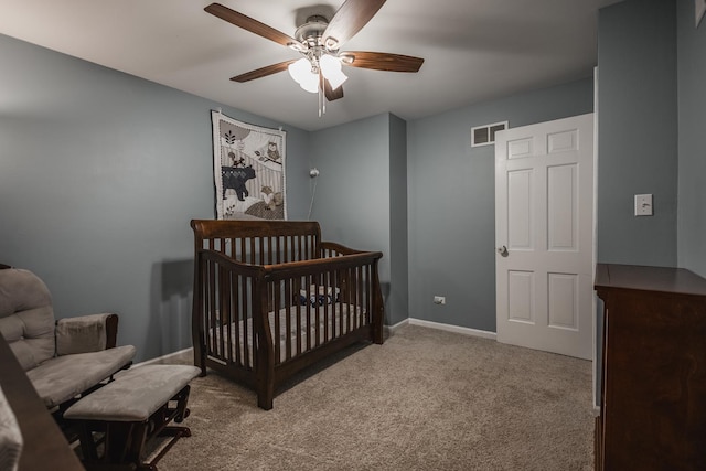 1706 Childs St, Wheaton, IL 60187 - carpeted bedroom featuring ceiling fan, a nursery area, and baseboards