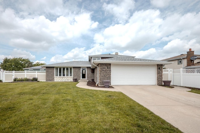 8440 Anvil Pl, Tinley Park, IL 60487 - view of front of property featuring a garage, driveway, and brick siding
