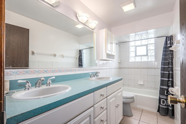 8440 Anvil Pl, Tinley Park, IL 60487 - full bath with tile patterned flooring, double vanity, toilet, shower / bath combo with shower curtain, and tile walls