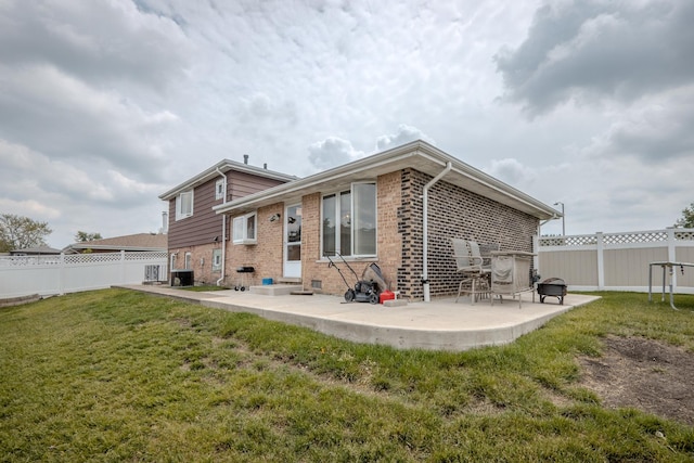 8440 Anvil Pl, Tinley Park, IL 60487 - rear view of property featuring a patio area, brick siding, and central AC unit