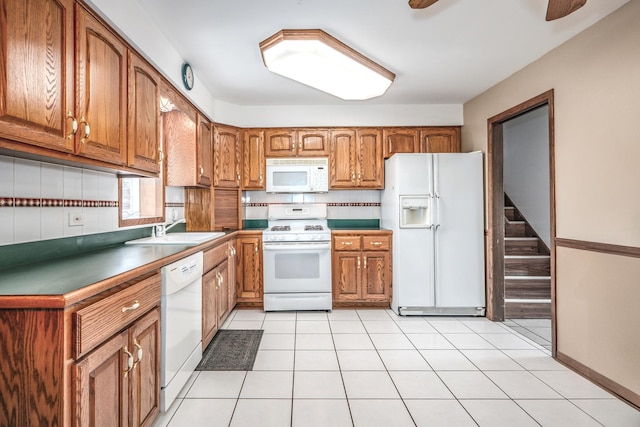 8440 Anvil Pl, Tinley Park, IL 60487 - kitchen featuring white appliances, a sink, brown cabinetry, and ceiling fan
