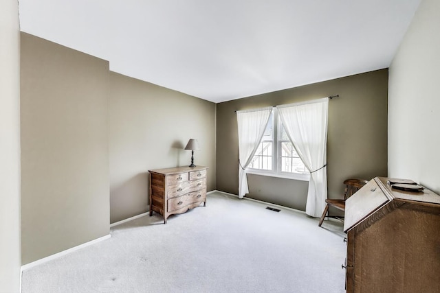 bedroom with carpet and baseboards