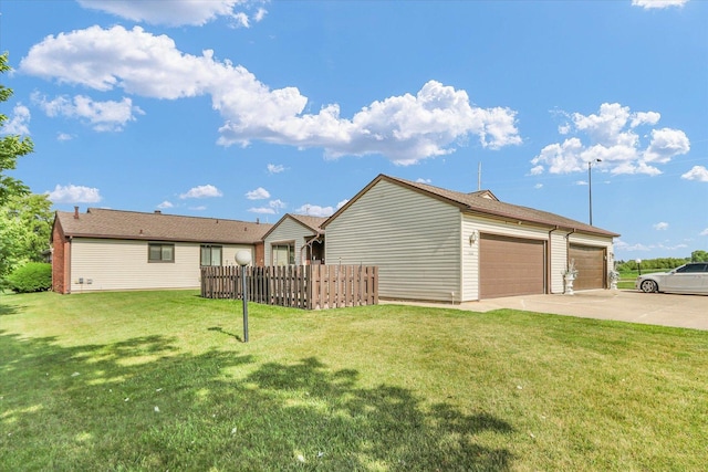 1109 Pomona Dr Unit 1109, Champaign, IL 61822 - back of property featuring driveway and a garage