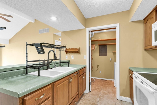 1109 Pomona Dr Unit 1109, Champaign, IL 61822 - kitchen with electric stove, a textured ceiling, brown cabinetry, light tile patterned floors, and electric panel