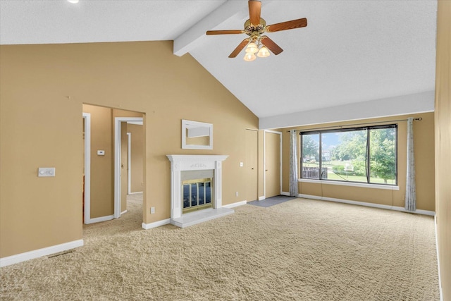 1109 Pomona Dr Unit 1109, Champaign, IL 61822 - unfurnished living room featuring ceiling fan, carpet, beam ceiling, high vaulted ceiling, and a high end fireplace