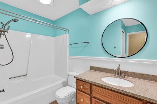 1109 Pomona Dr Unit 1109, Champaign, IL 61822 - full bathroom featuring wainscoting, vanity, and shower / bathtub combination