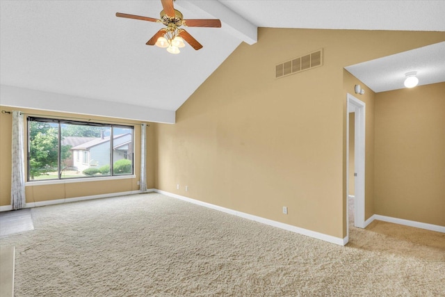 1109 Pomona Dr Unit 1109, Champaign, IL 61822 - spare room with carpet flooring, beamed ceiling, ceiling fan, and high vaulted ceiling