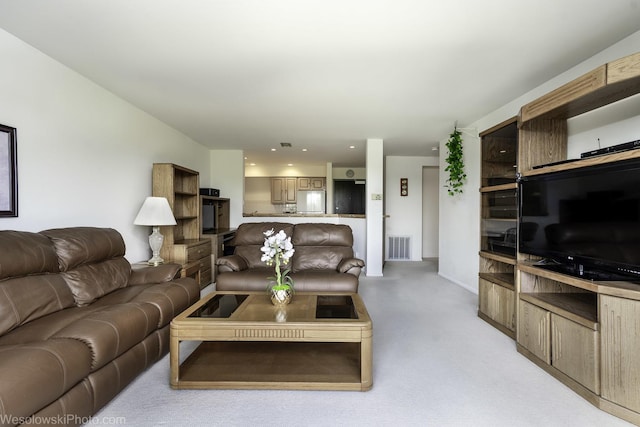 living area with recessed lighting