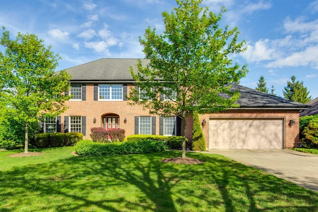 337 S Harrison Ct, Palatine, IL 60067 - colonial home with a garage, driveway, brick siding, and a front lawn